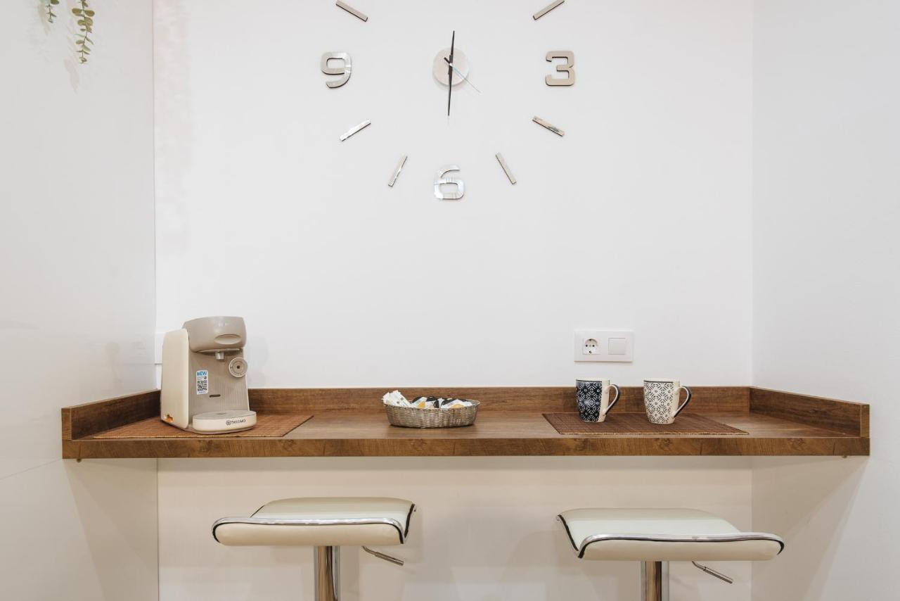 El Apartamento Del Reloj De Sol Sevilla Buitenkant foto