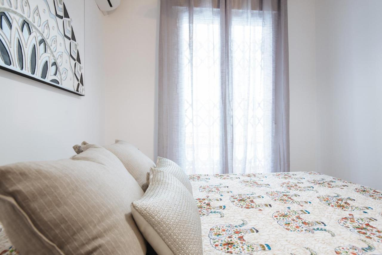 El Apartamento Del Reloj De Sol Sevilla Buitenkant foto